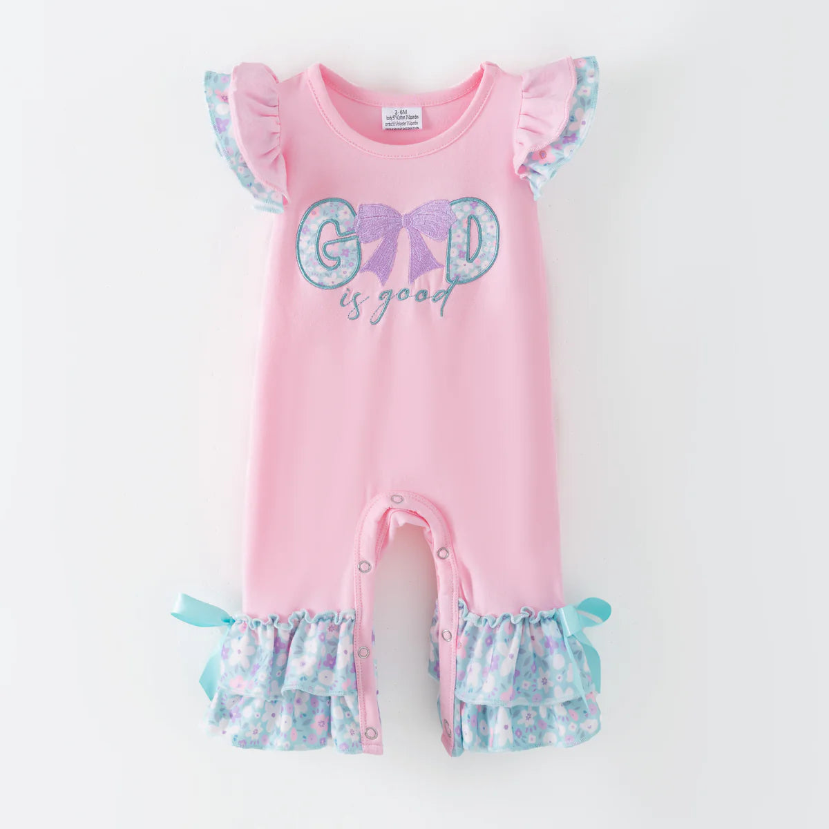 Pink God Is Good baby girl romper with ruffle sleeves and floral leg details